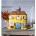 Image of Lion Brand Yarn Cosy Yellow House Pillow Pattern